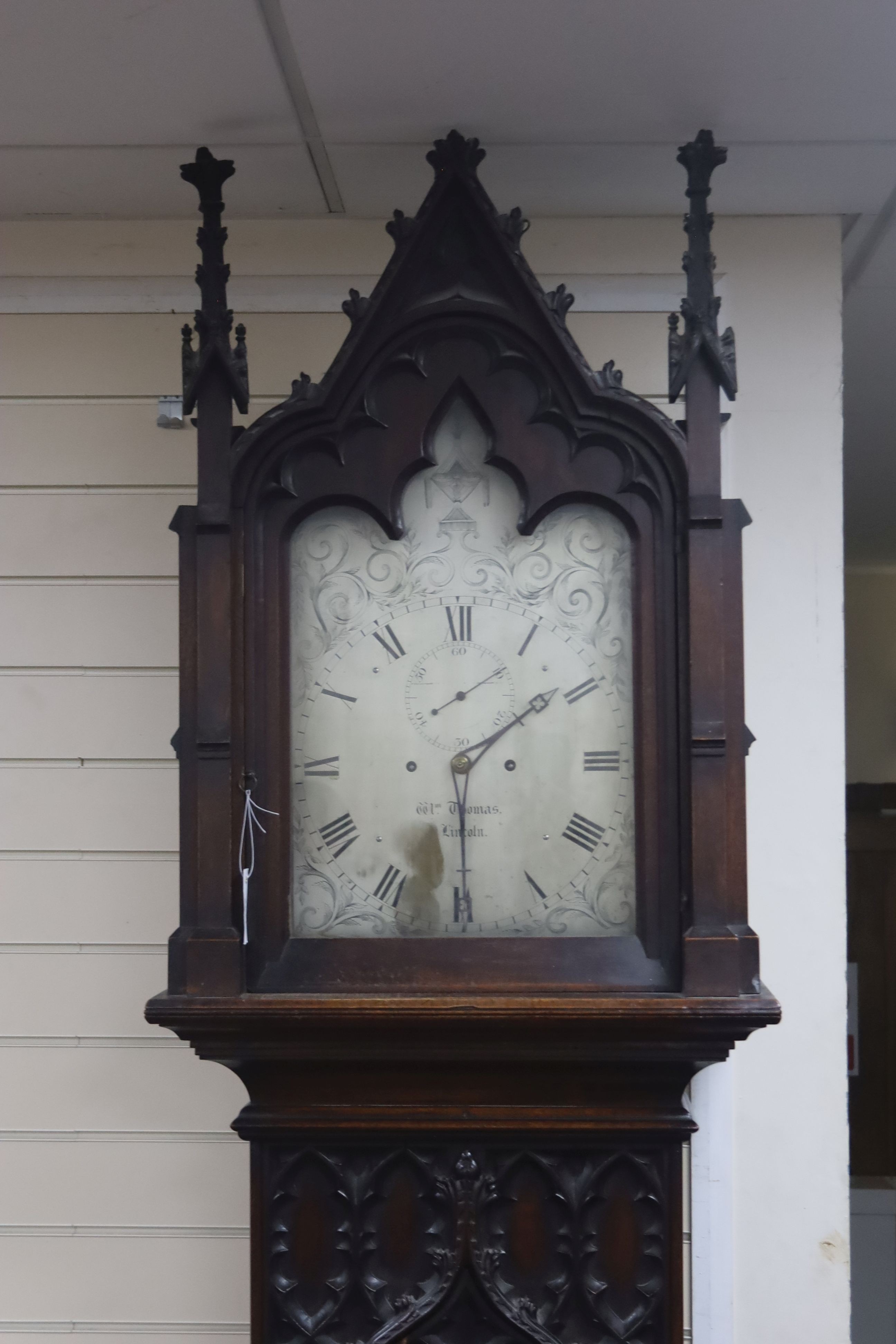 A William IV Gothic revival mahogany longcase clock, the twin train movement with deadbeat, height 258cm